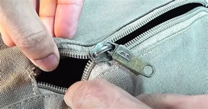 How do I get my purse zipper unstuck?