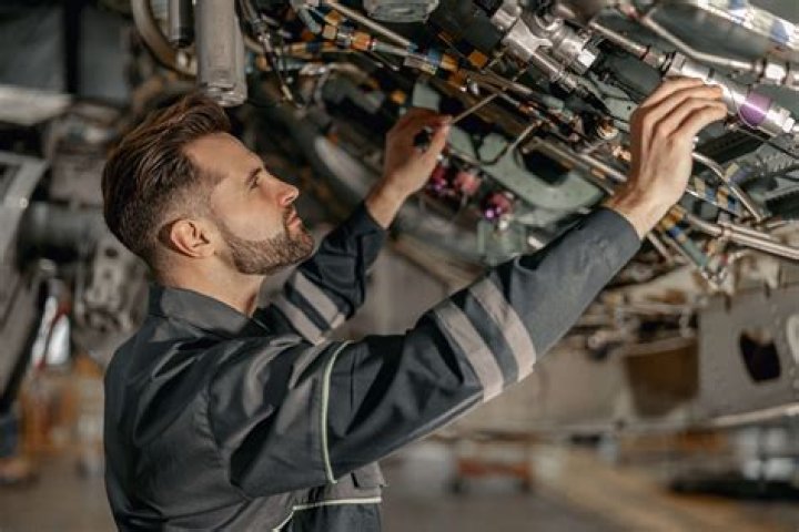 What are places that employ trained automotive mechanics and technicians?